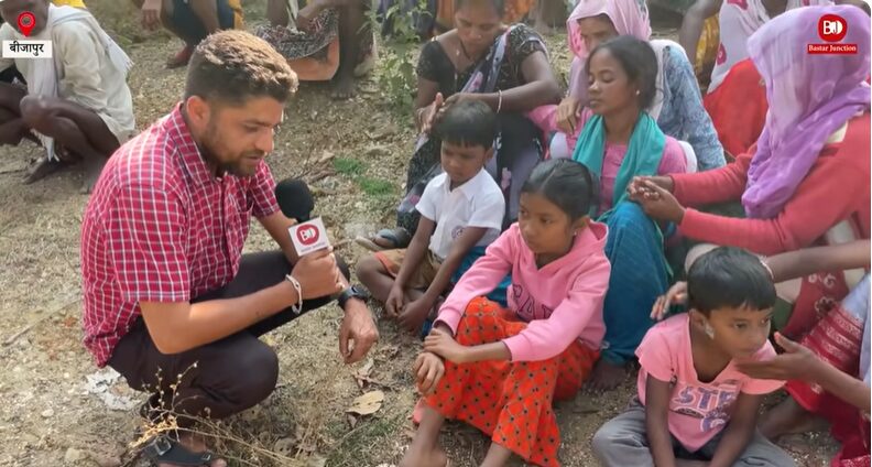 Mukesh Chandrakar interview with a young girl.