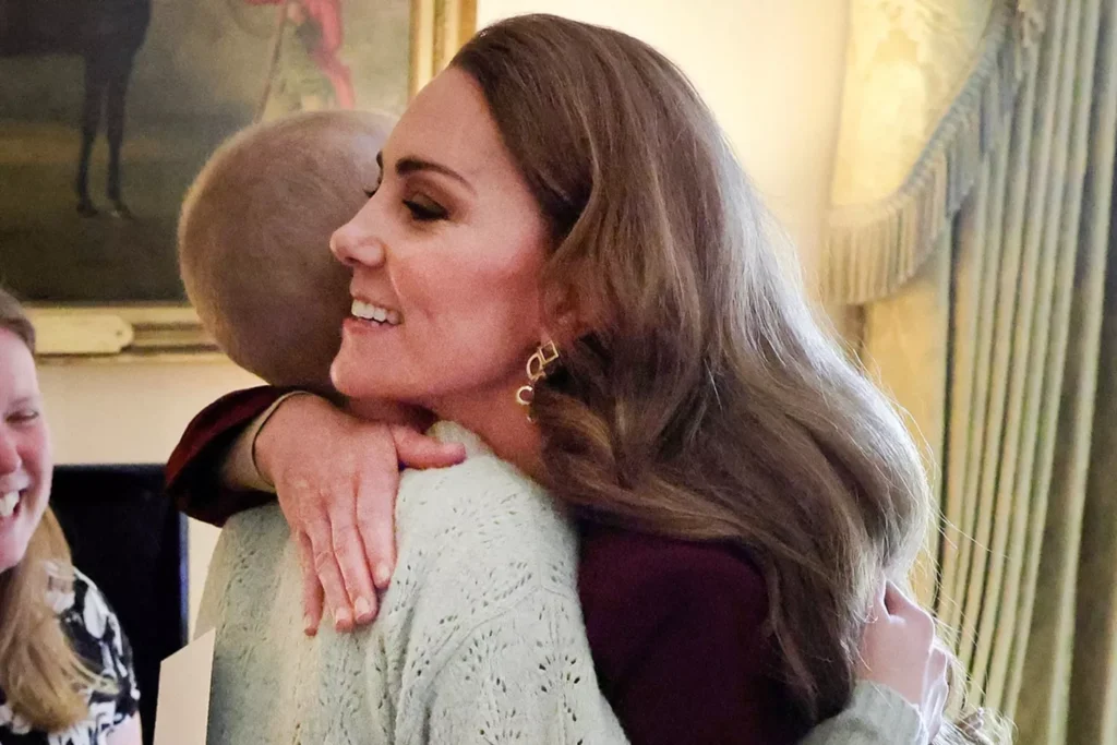 Kate middleton hugging cancer patient