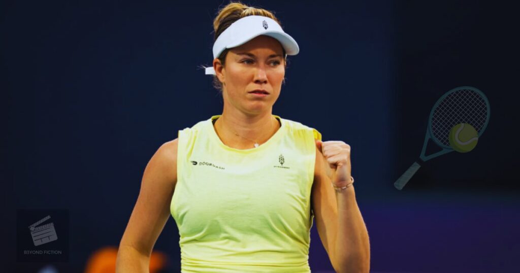 Danielle Collins hitting a forehand during her 2025 Strasbourg Open match against Emma Raducanu.