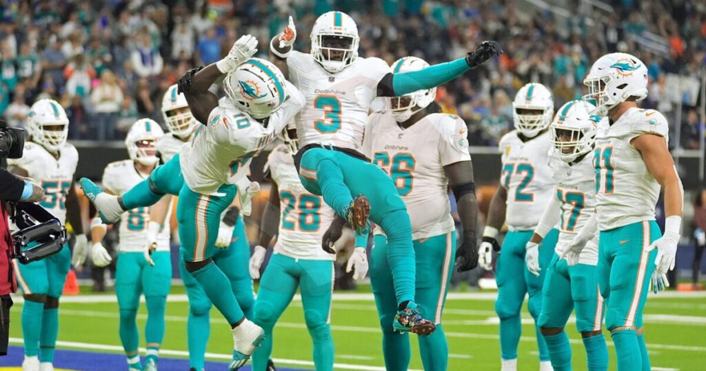 Miami Dolphins vs. Los Angeles Rams in NFL game action.