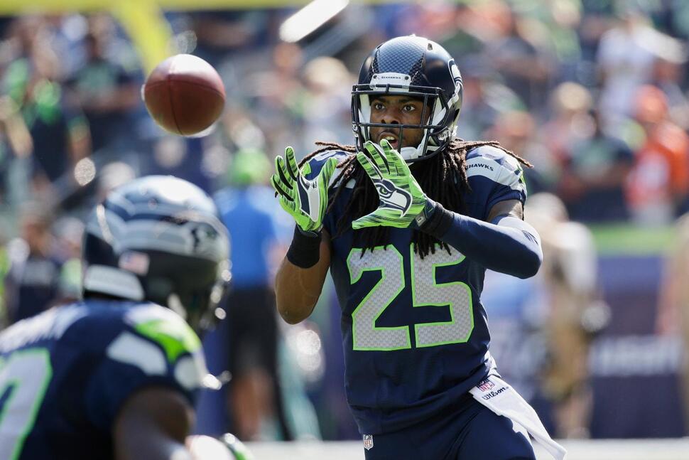 Richard Sherman warms up before Seahawks vs. Broncos game in 2014